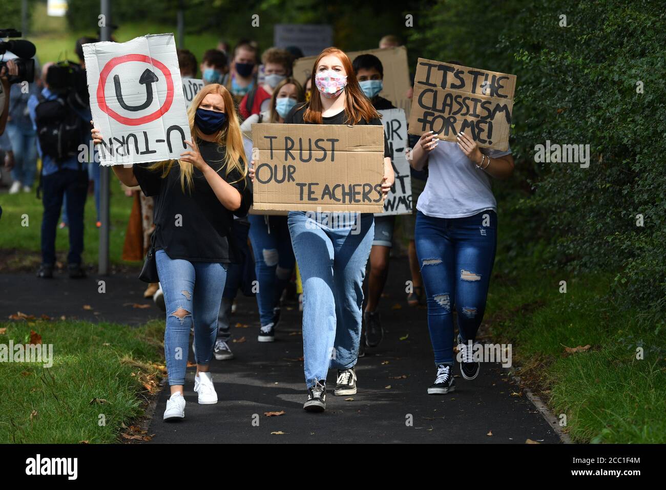 Students from Codsall Community High School march to the constituency office of their local MP Gavin Williamson, who is also the Education Secretary, as a protest over the continuing issues of last week's A level results which saw some candidates receive lower-than-expected grades after their exams were cancelled as a result of coronavirus. Stock Photo
