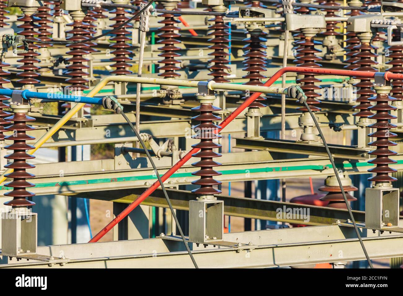 Close up of an electricity distribution station with large isolators Stock Photo