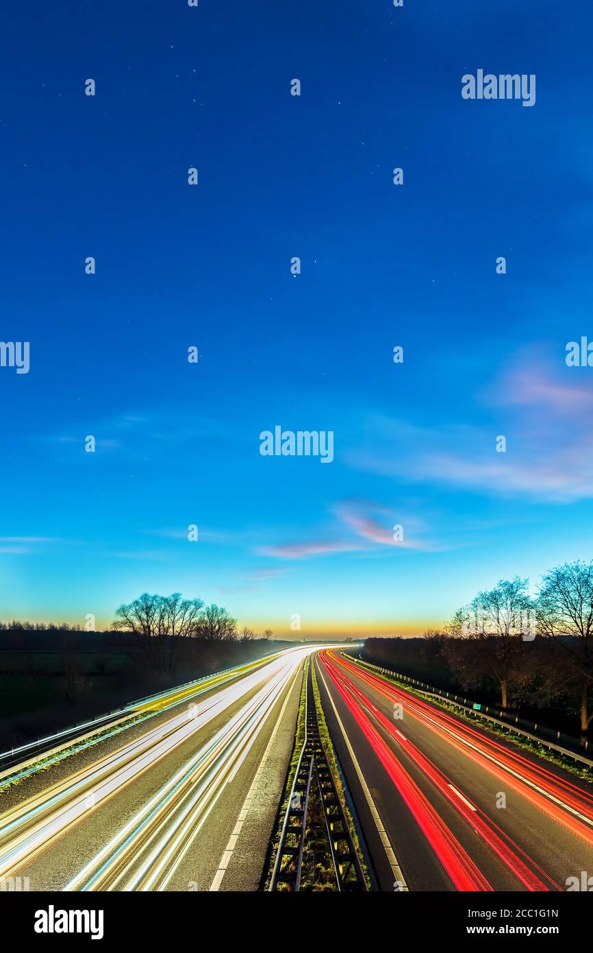 Night view with stars of the highway between the Dutch cities of Arnhem and Doesburg Stock Photo