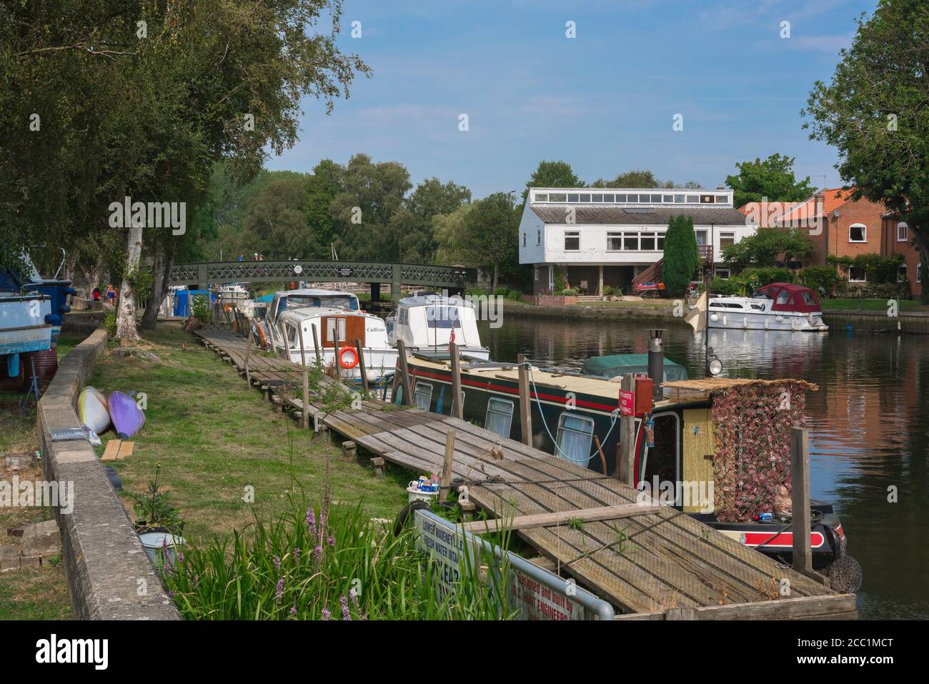 Beccles River Waveney, view in summer of landing stages sited along the Waveney waterfront in the Suffolk town of Beccles, East Anglia, England, UK Stock Photo