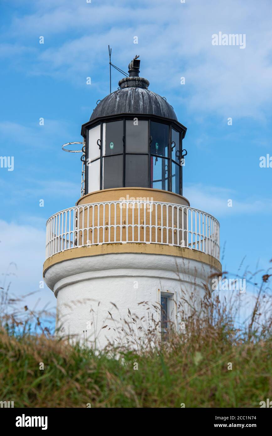 Cromarty Lighthouse was designed by Robert Louis Stevenson's uncle, Alan Stevenson. It became operational in 1846 On the North East tip of the Black I Stock Photo