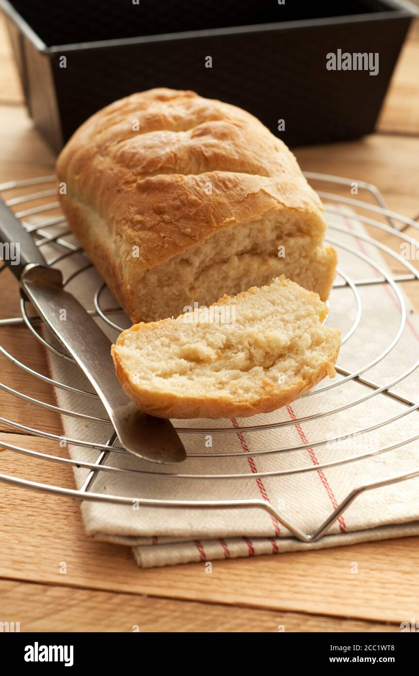 White bread on cooling rack, close up Stock Photo