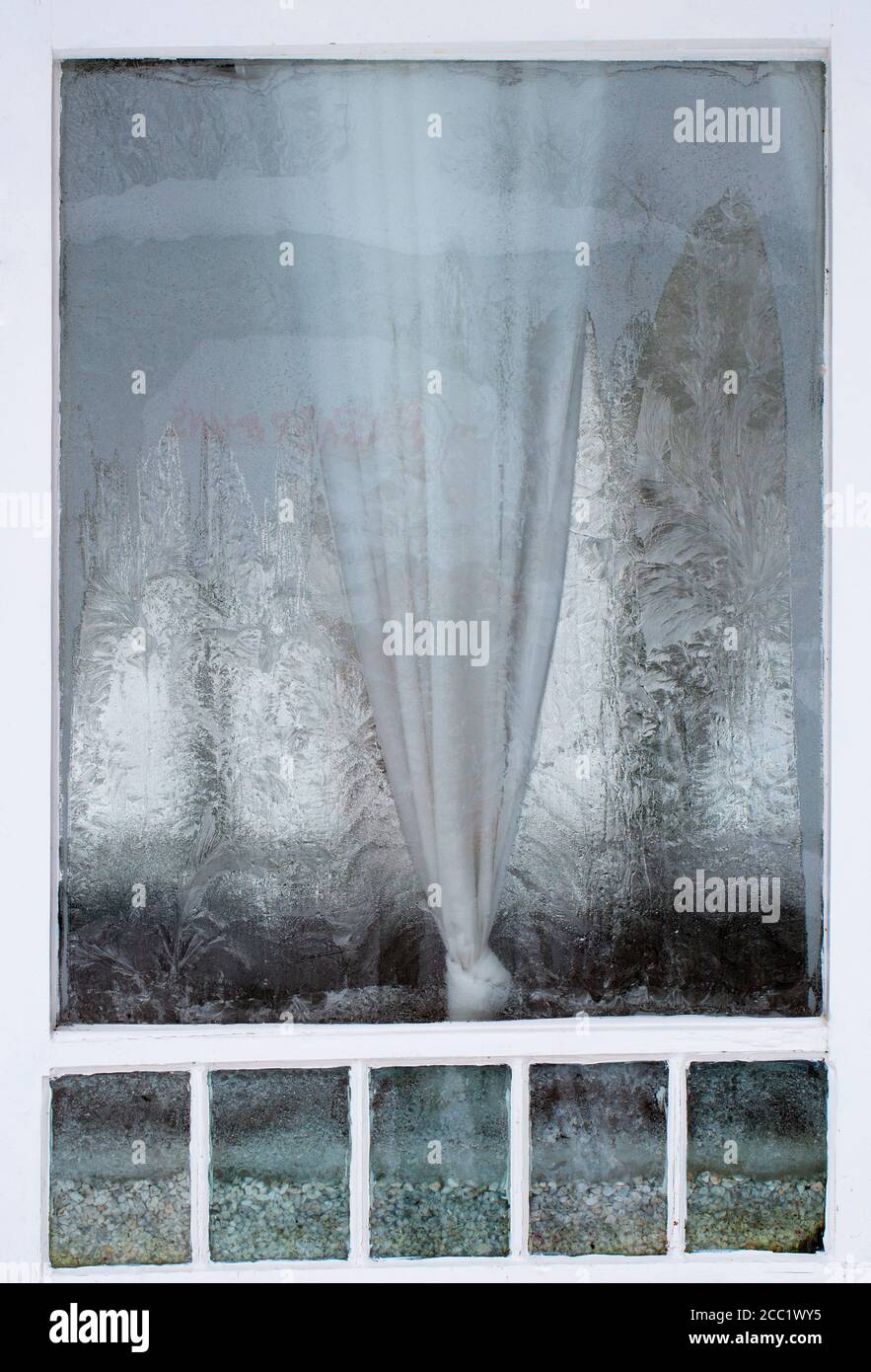 Austria, Window with ice crystal Stock Photo
