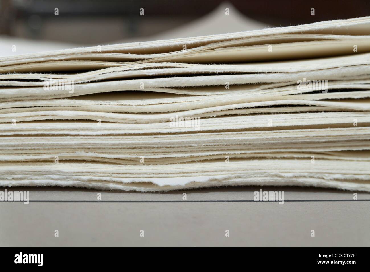 Deckle edge paper for copperplate printing in print shop hires stock