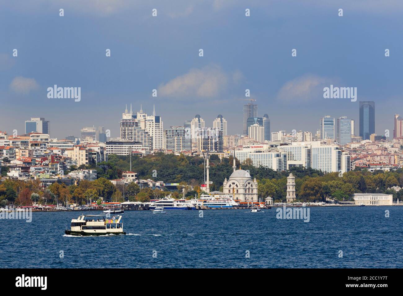 Turkey, Istanbul, View of Dolmabache Mosque and high rises in Sisli Stock Photo