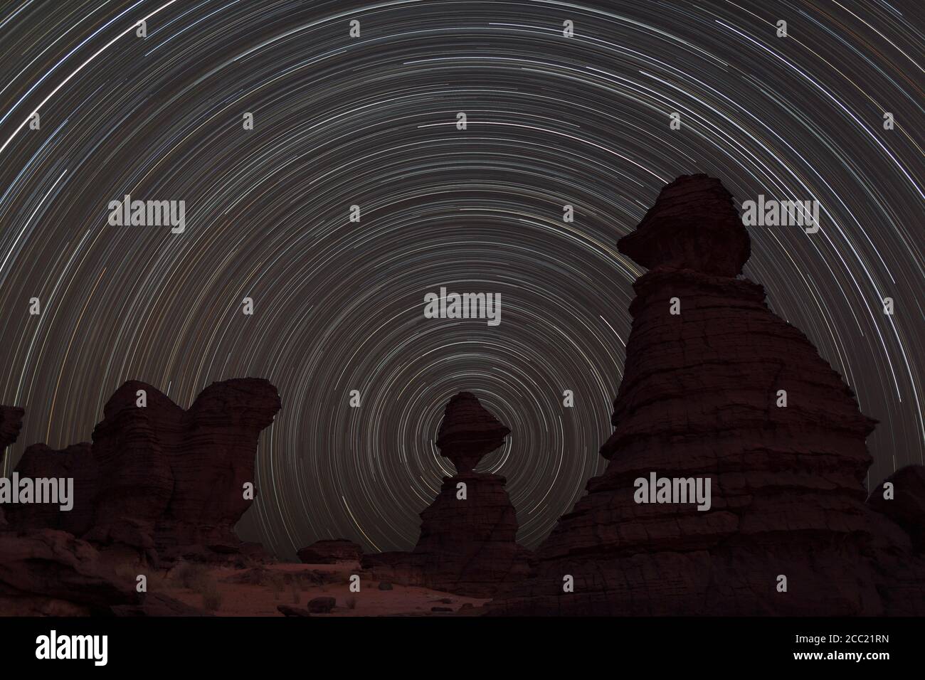 Africa, Chad, View of star trail and rock formation at Ennedi range Stock Photo