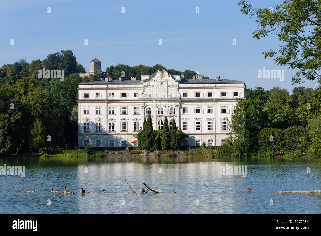 Austria, Salzburg, View of Leopoldskron Castle at Leopoldskroner Teich pond Stock Photo