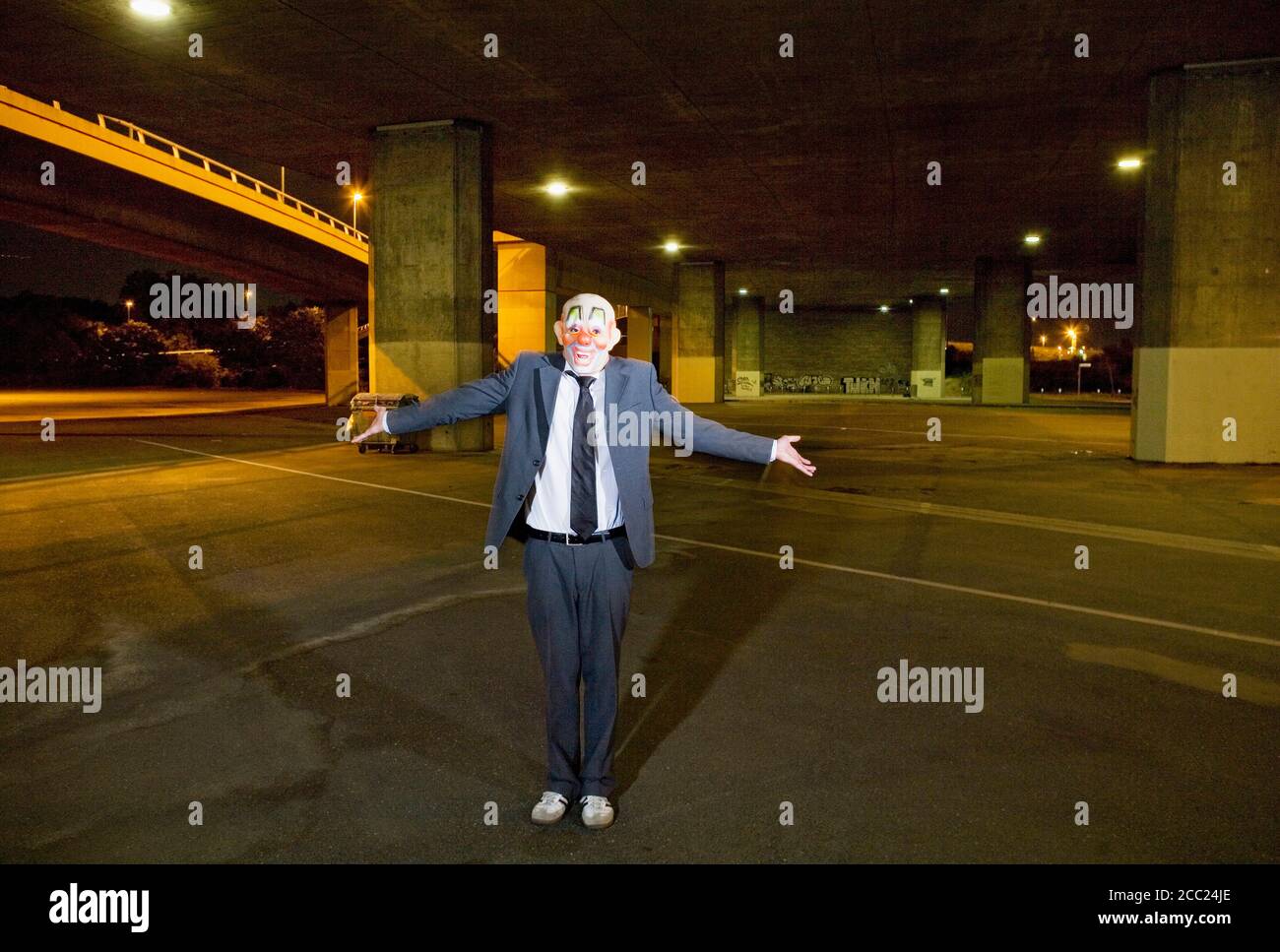 Germany, Cologne, Man wearing clown mask, portrait Stock Photo Alamy