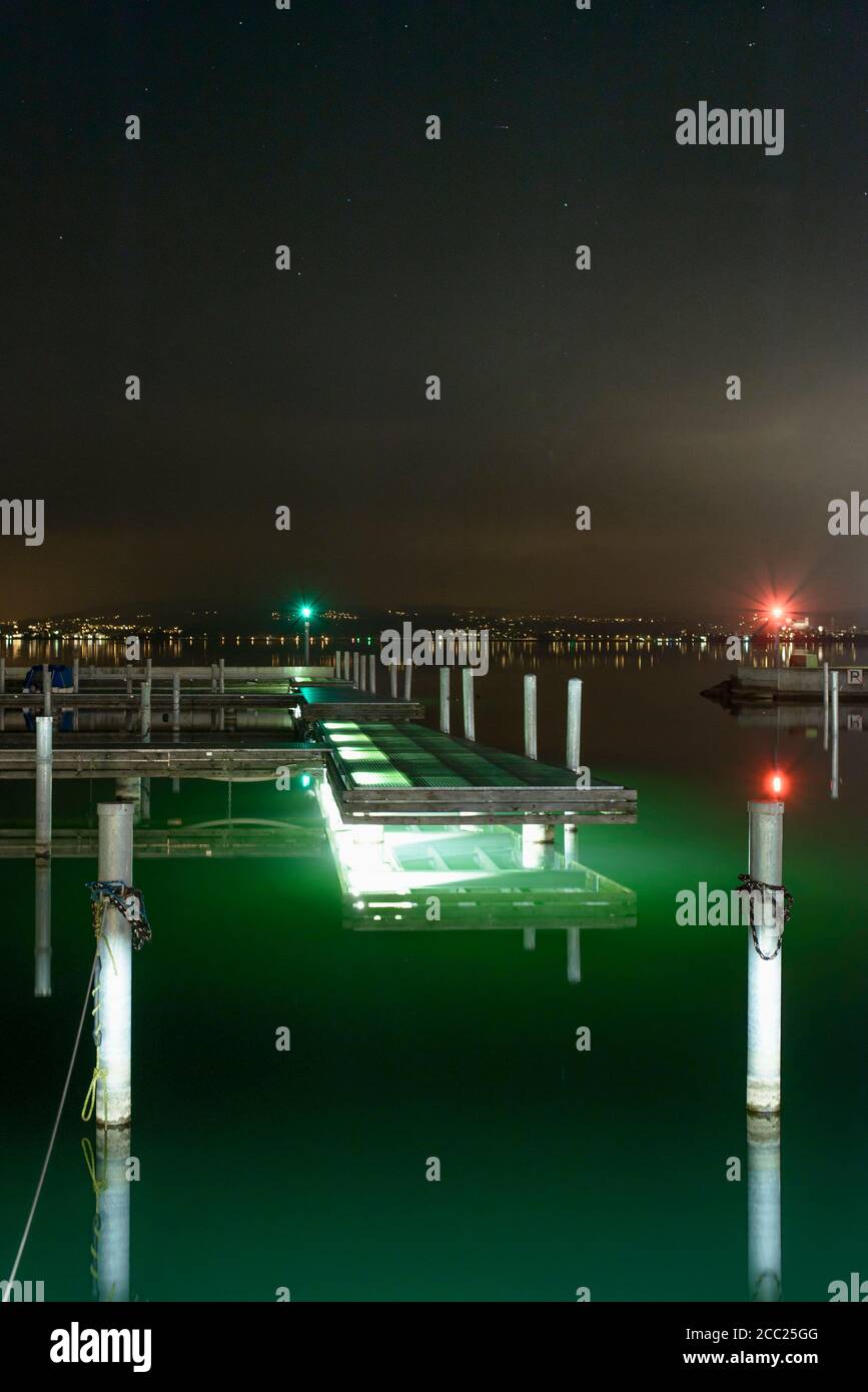 Switzerland, Lachen, View of harbour at night Stock Photo