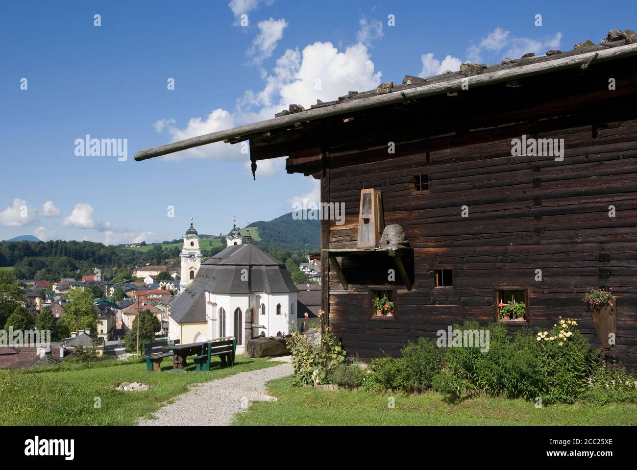 Austria, Mondsee (city), View of house and church in background Stock Photo