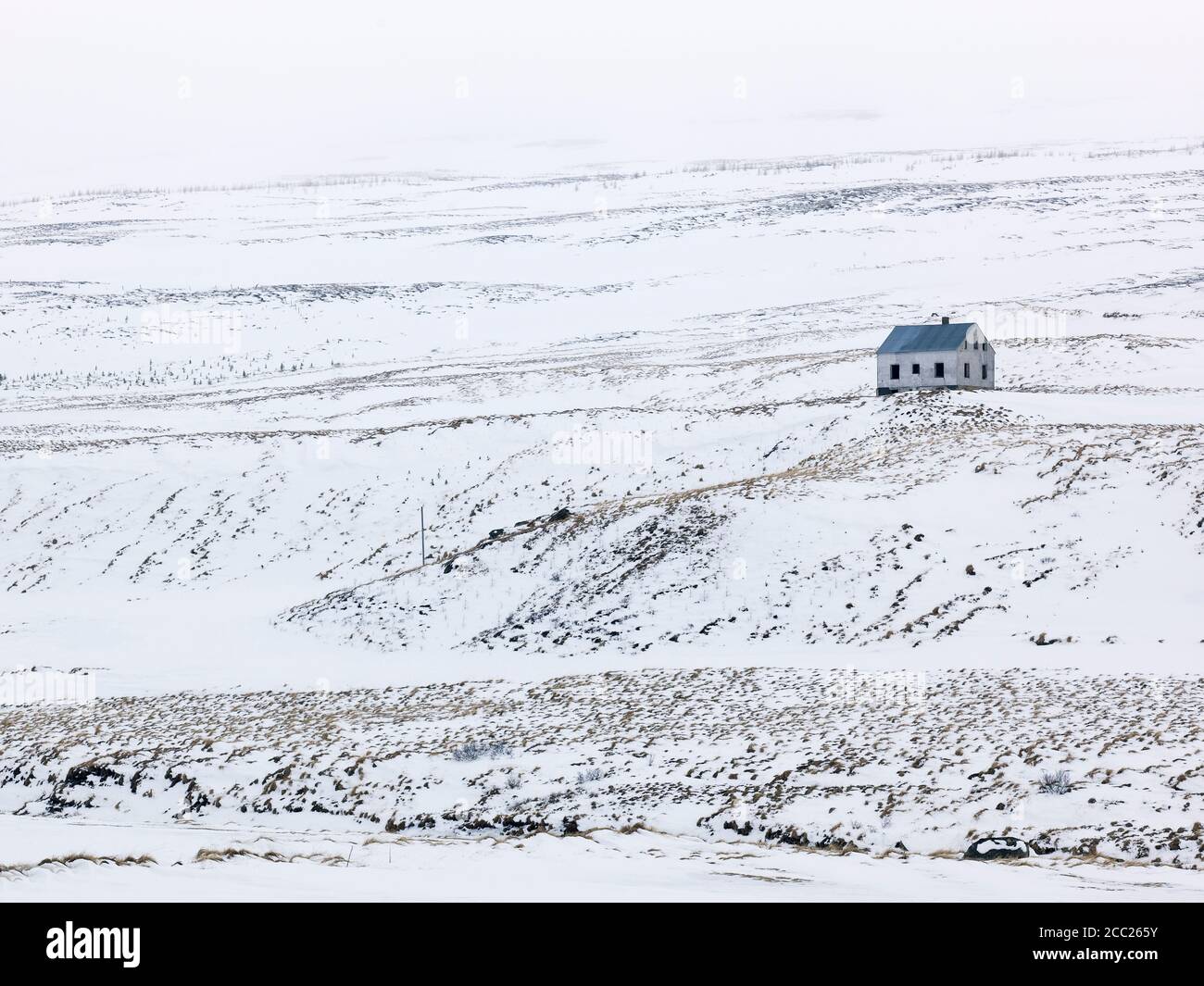 Iceland, View of lonely house in wintery landscape Stock Photo