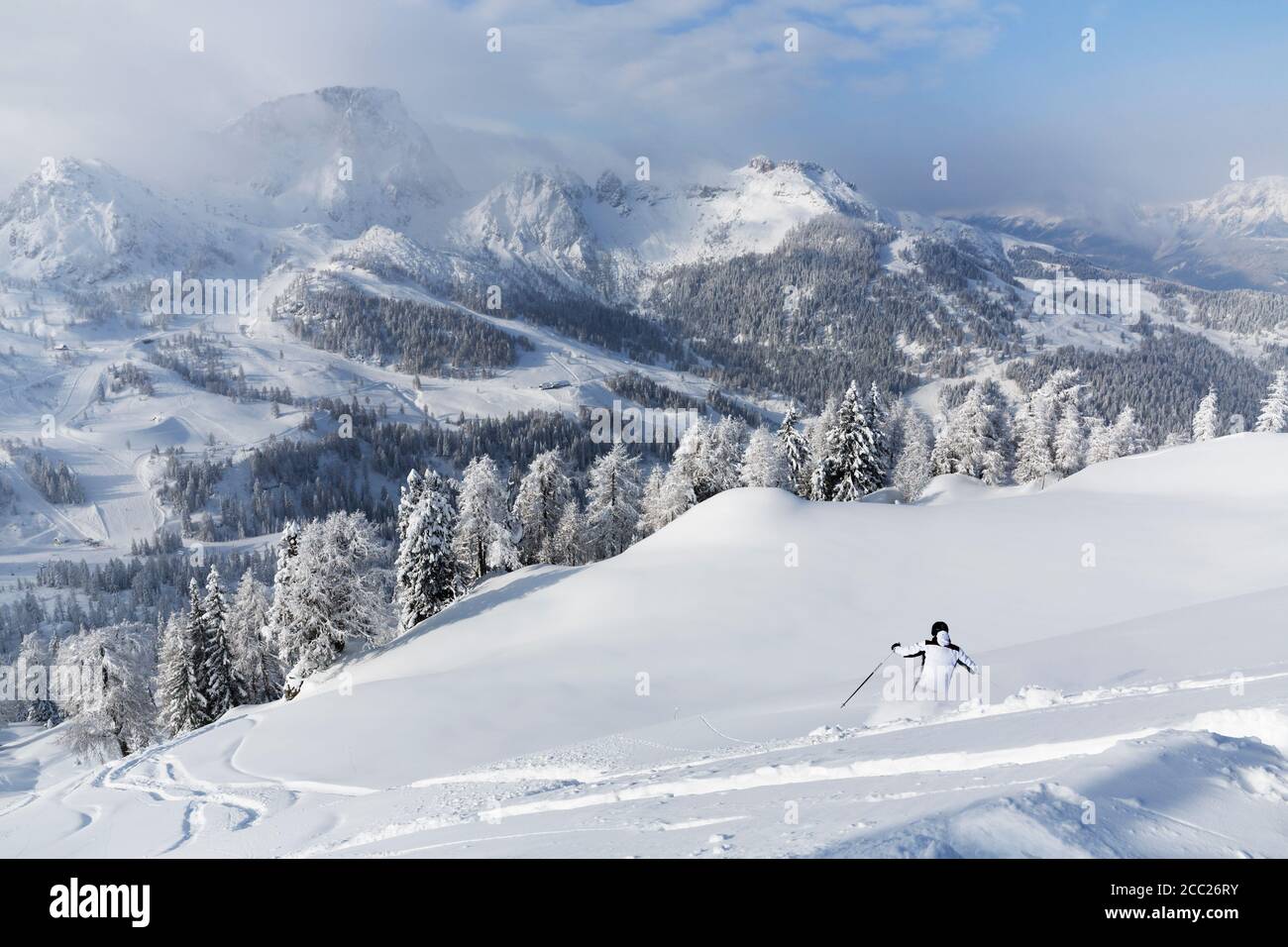 Austria, Carinthia, Person skiing in snow Stock Photo