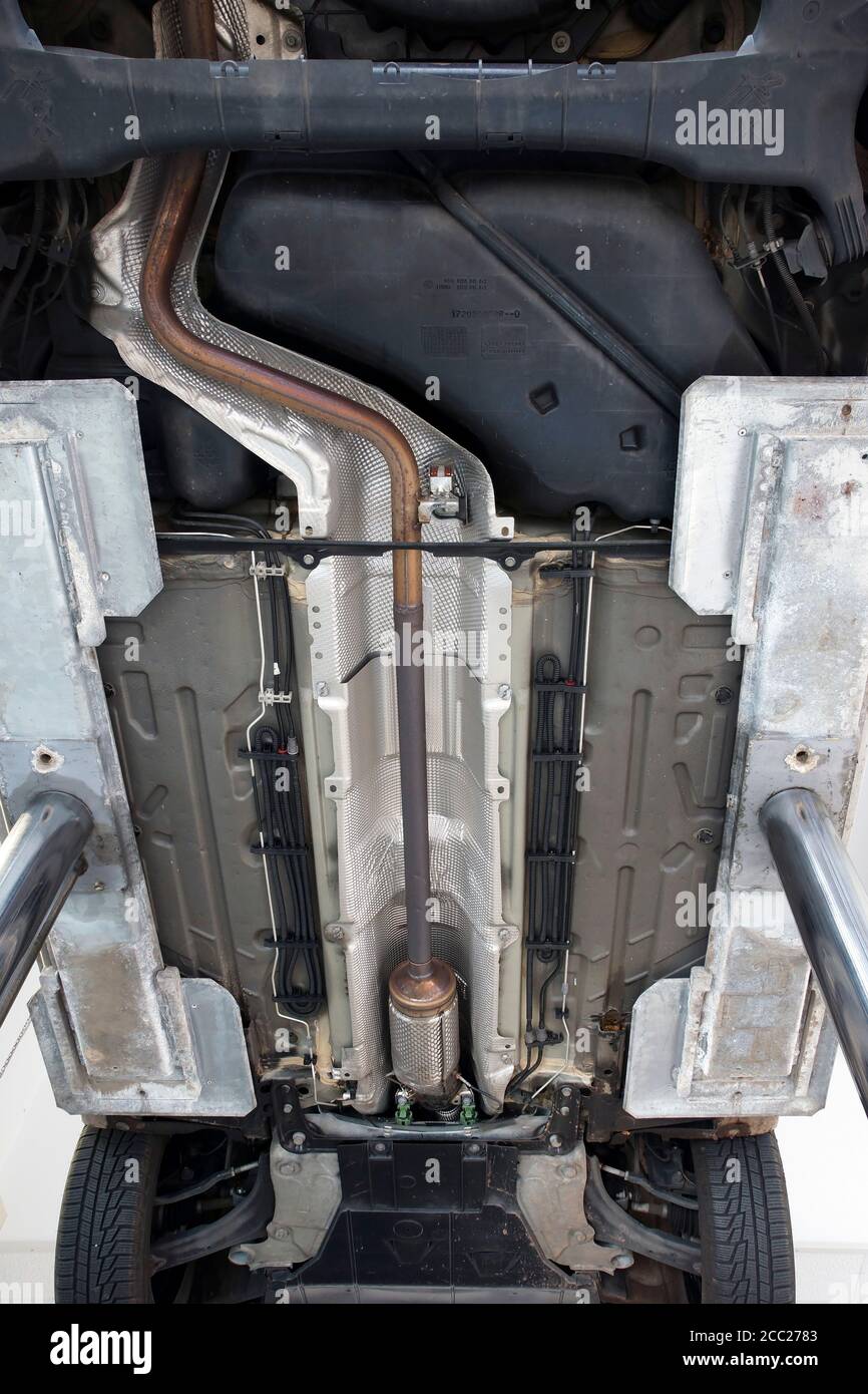 Germany, Bottom of car with exhausting pipe, close up Stock Photo Alamy