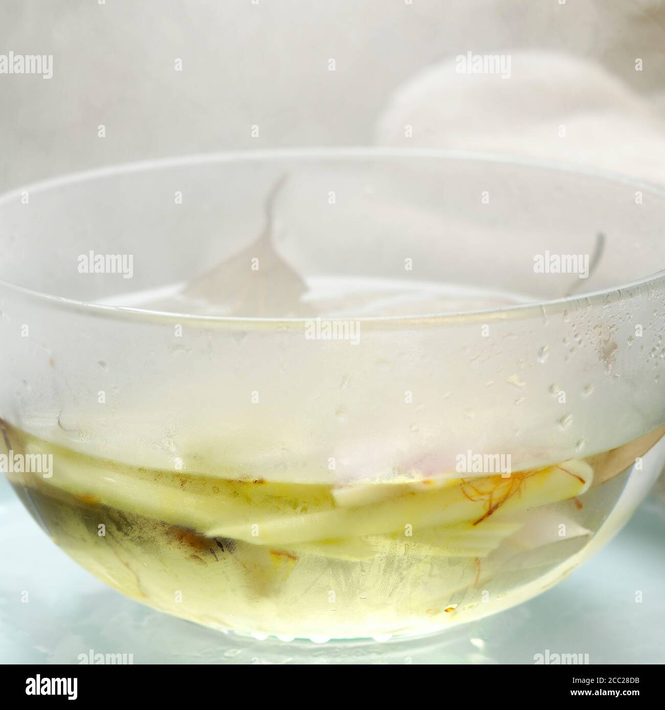 Lemongrass in bowl with hot water Stock Photo