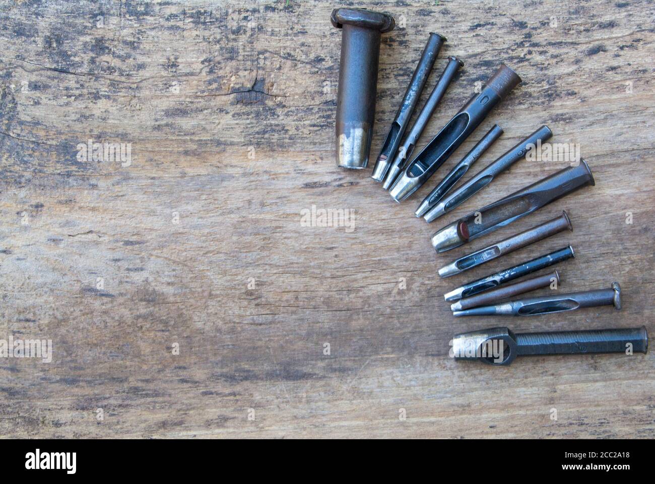 Leather tool for craftsmans. Punches in diferent sizes. Stock Photo