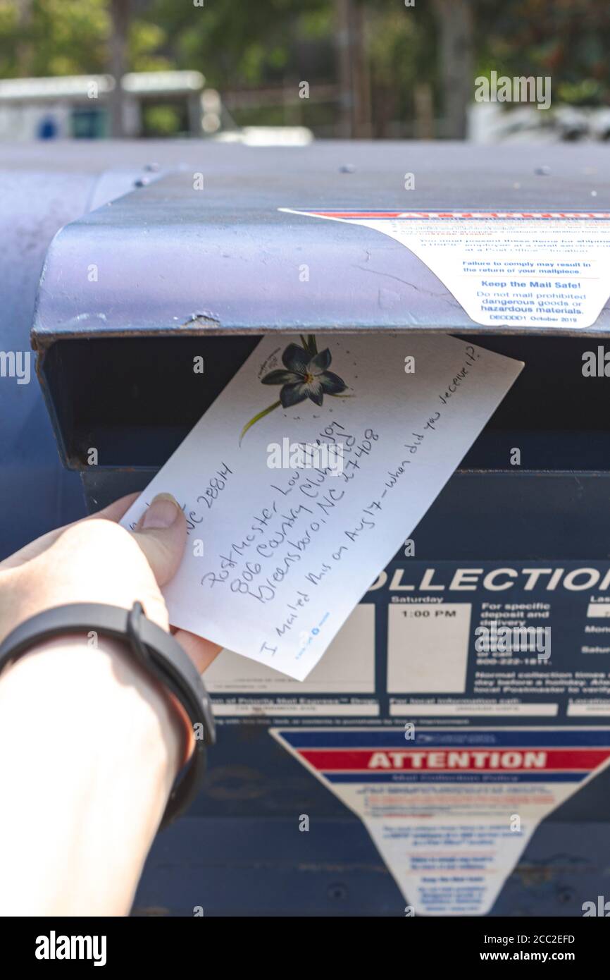 Asheville Nc Usa 17th Aug As The United States Postal Service Seems Under Siege By President Trump In An Attempt To Hinder Vote By Mail An American Mails A Postcard Of Protest To