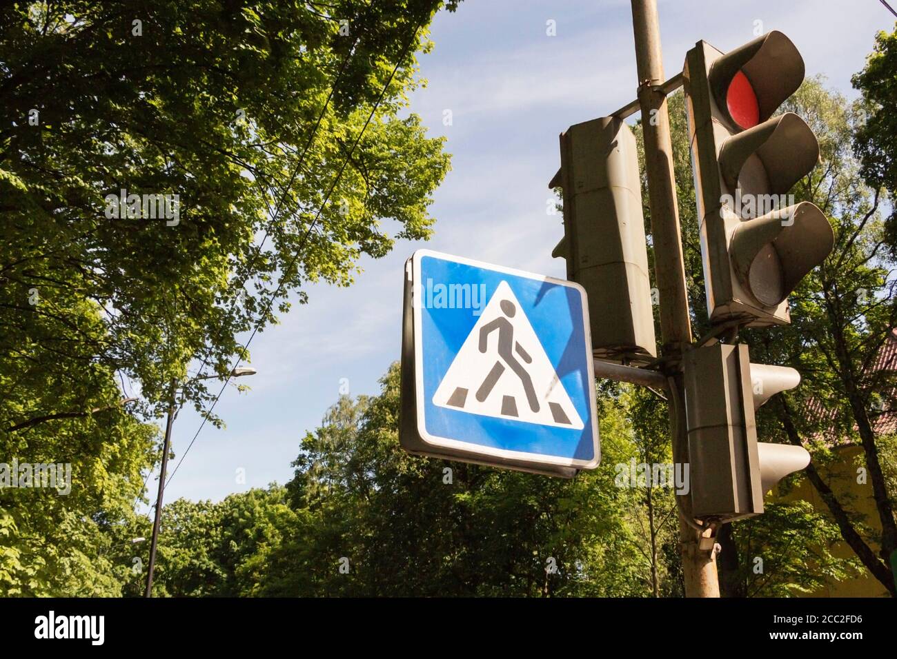 photo traffic light and sign of a pedestrian crossing in the city Stock ...