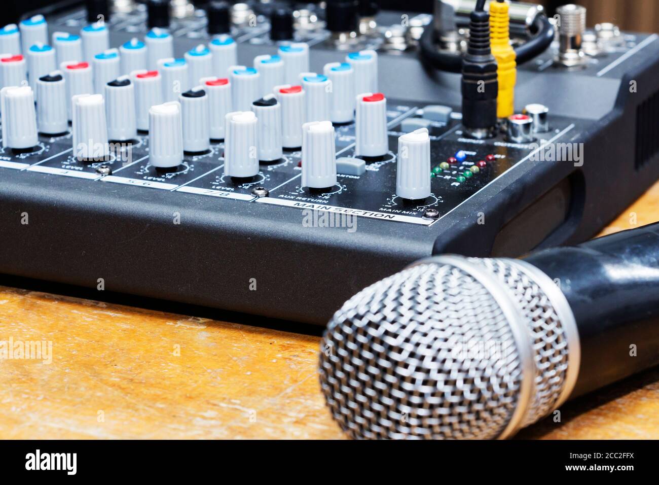 Professional condenser studio microphone over the musician blurred