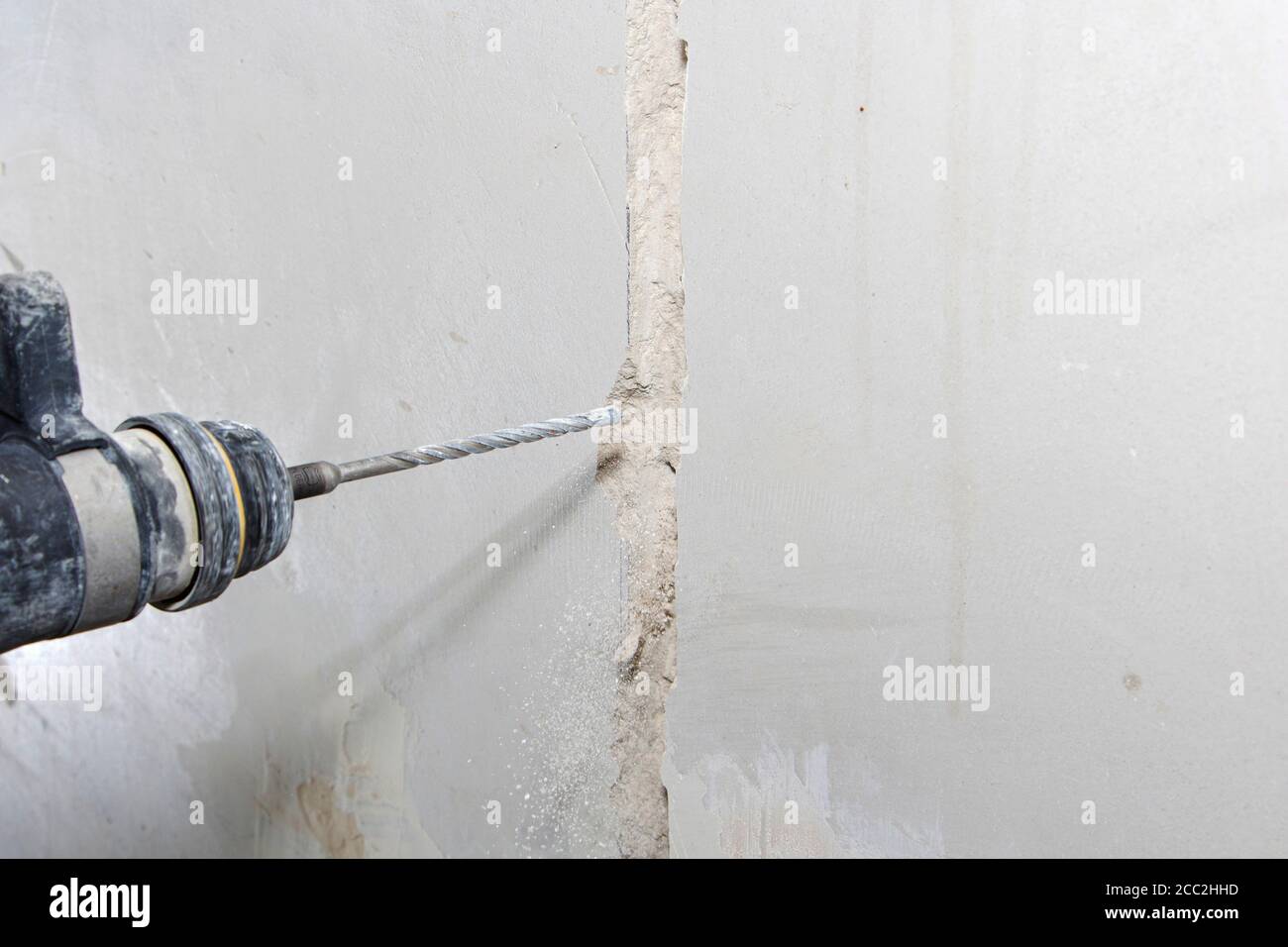 drill hole for electrical outlet outlet, special power tool drill Stock