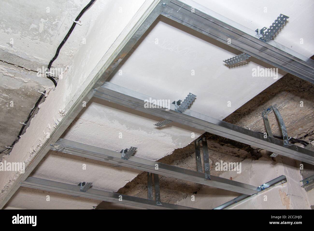 metal frame for installation of drywall panels of home design Stock Photo