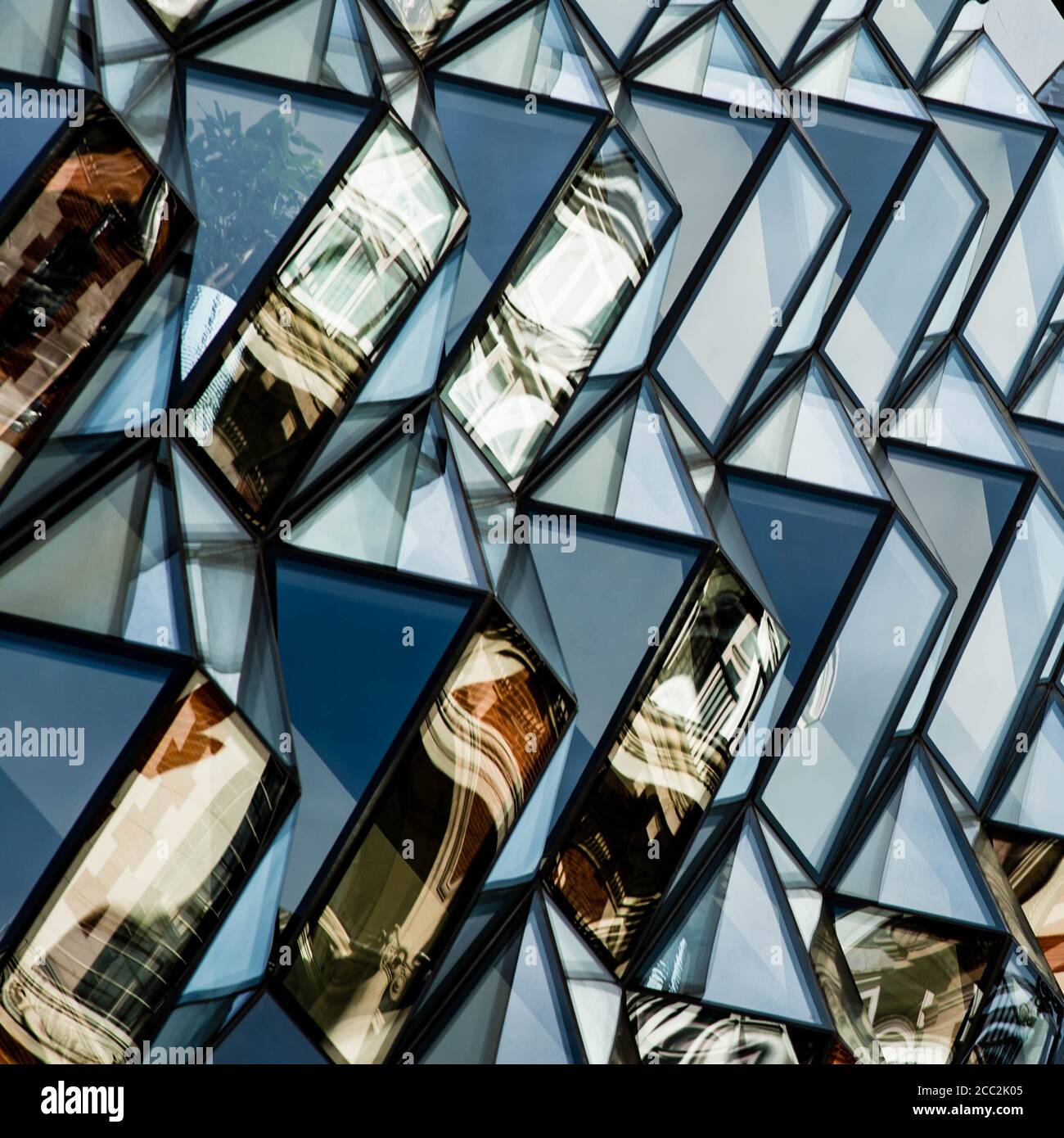 Architectural Geometric Glass Facia On A Modern Building With No People Stock Photo