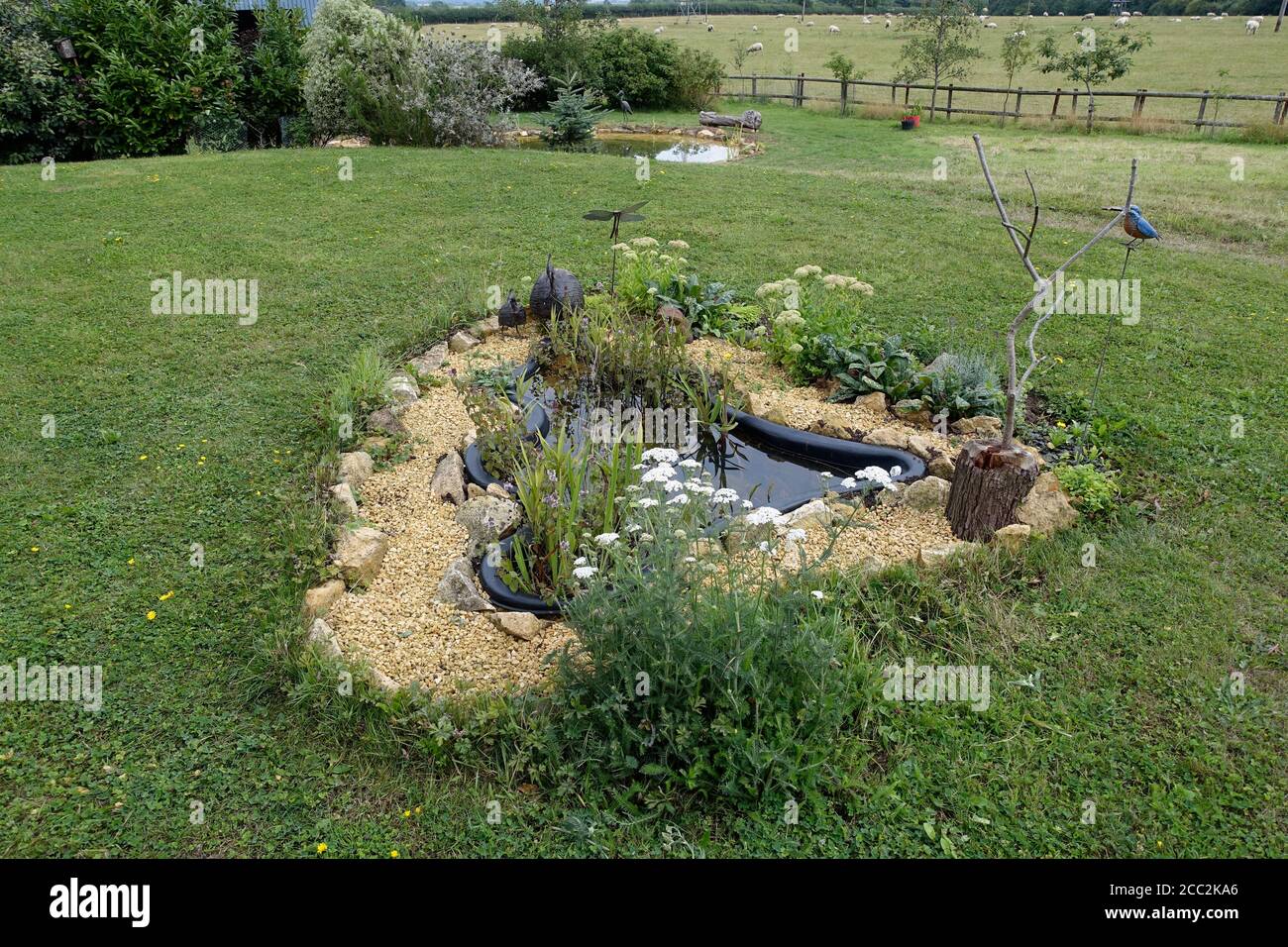 Rigid pond liner hires stock photography and images Alamy