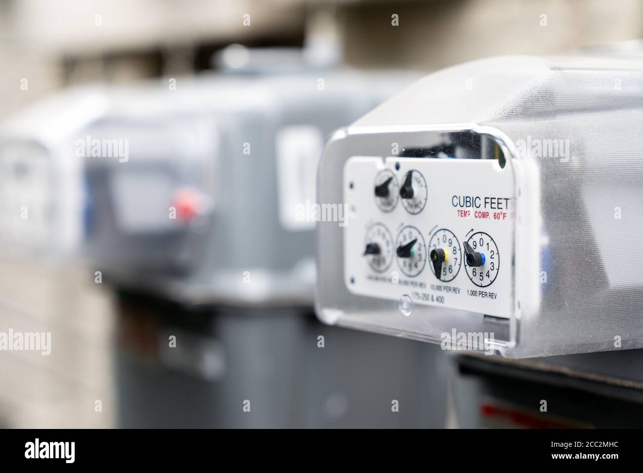 Natural gas meters at an apartment Stock Photo Alamy