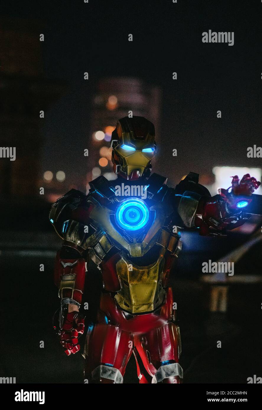 Cosplayer in image of a character Iron Man stands against 