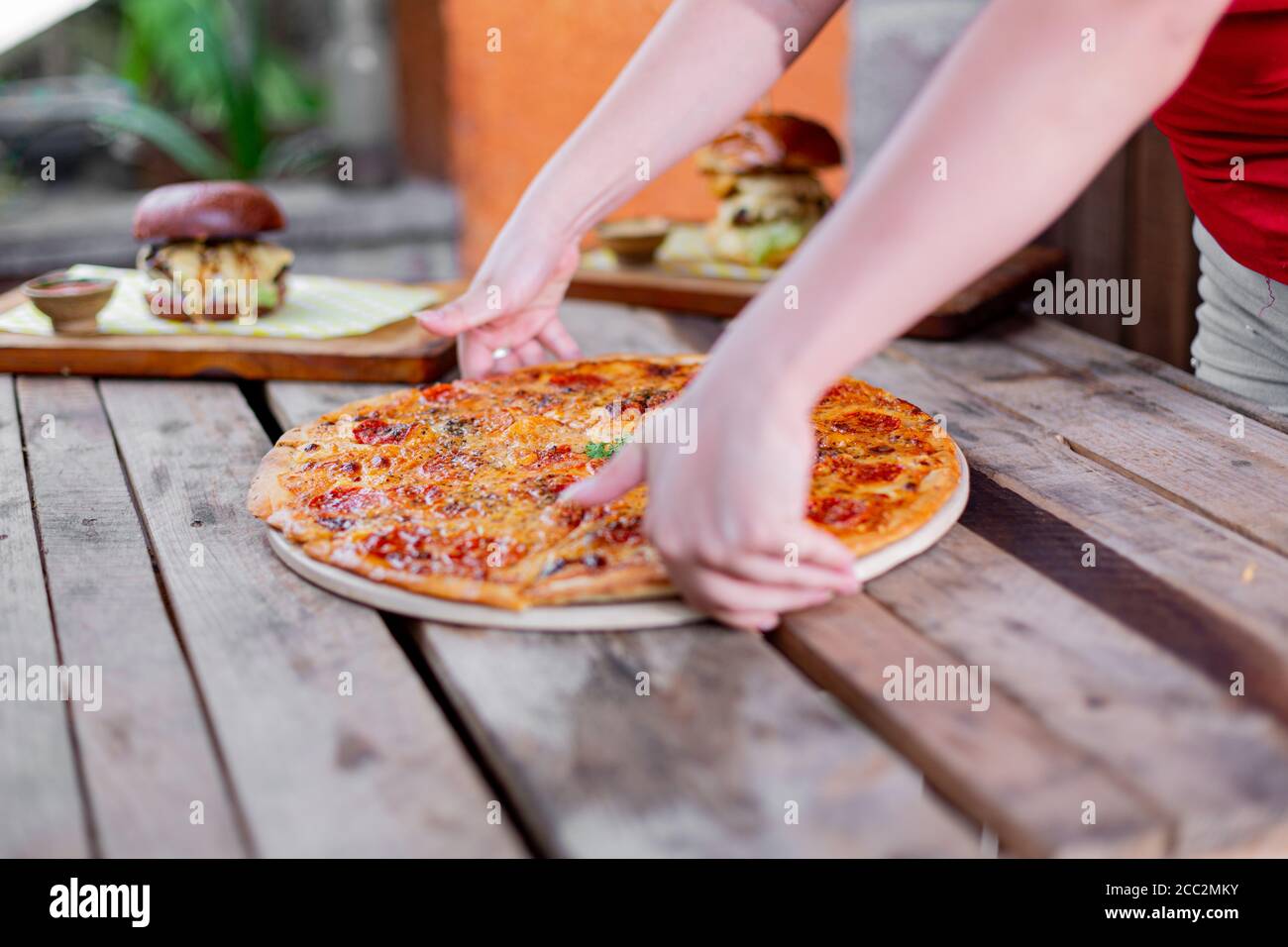 Person Serving Fresh Pizza Hi res Stock Photography And Images Alamy person-serving-fresh-pizza-hi-res-stock-photography-and-images-alamy