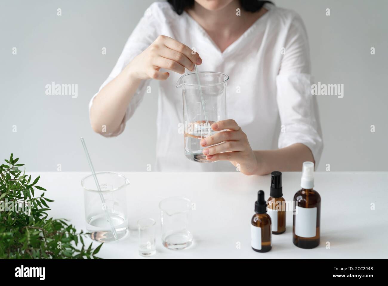 The scientist, dermatologist testing the organic natural cosmetic