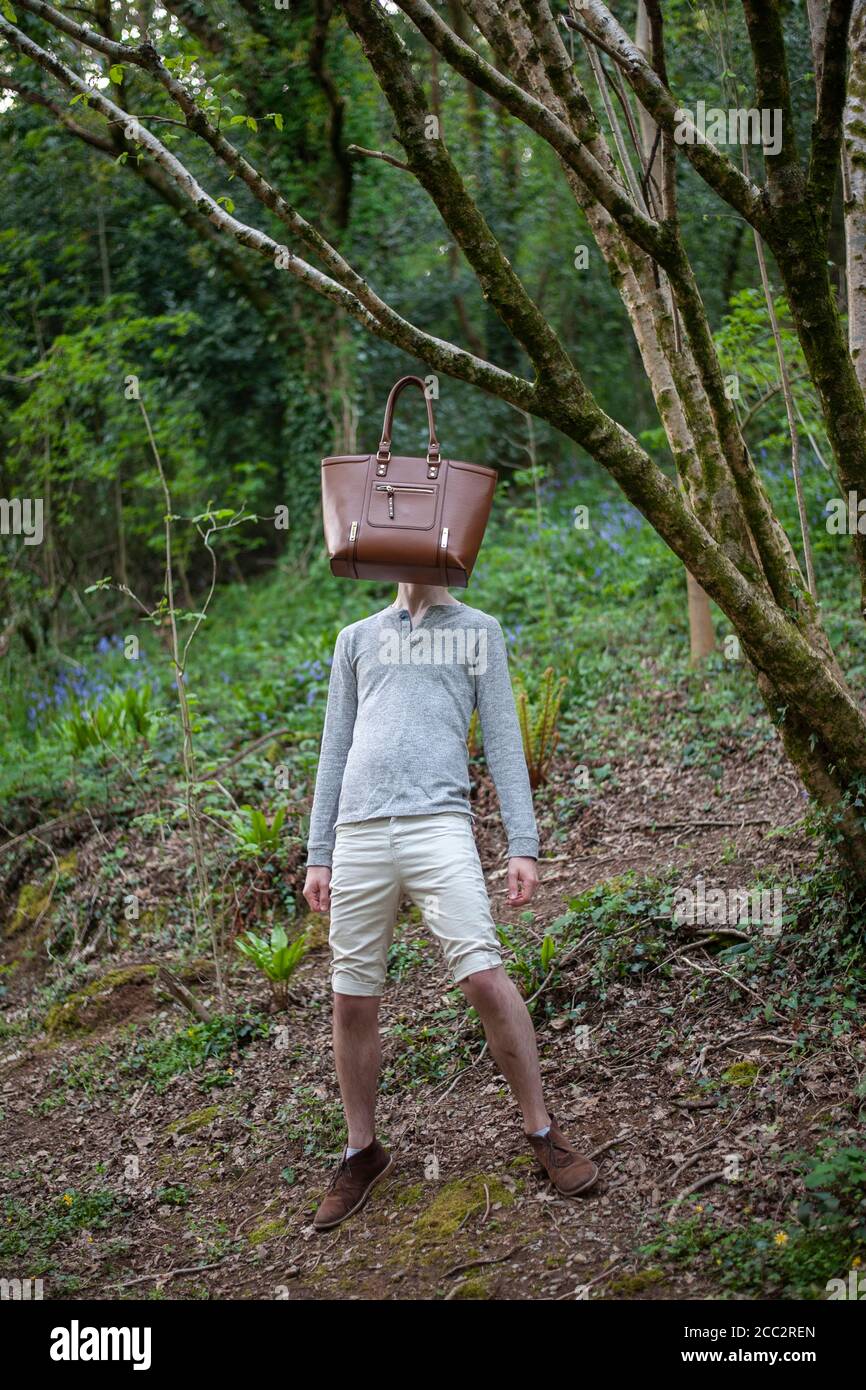 Faceless Boy in Woods Stock Photo