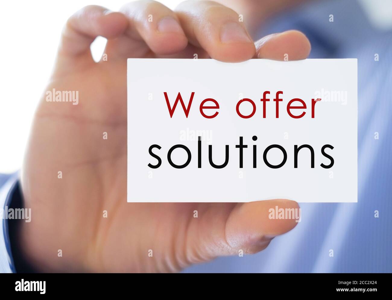 we offer solutions - business card information Stock Photo