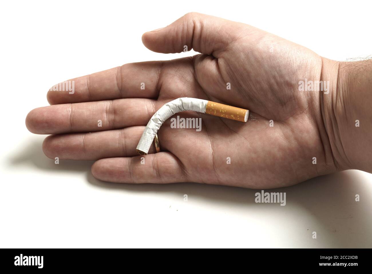cigarette impotence How Smoking Causes Erection Issues man's hand holding a folded