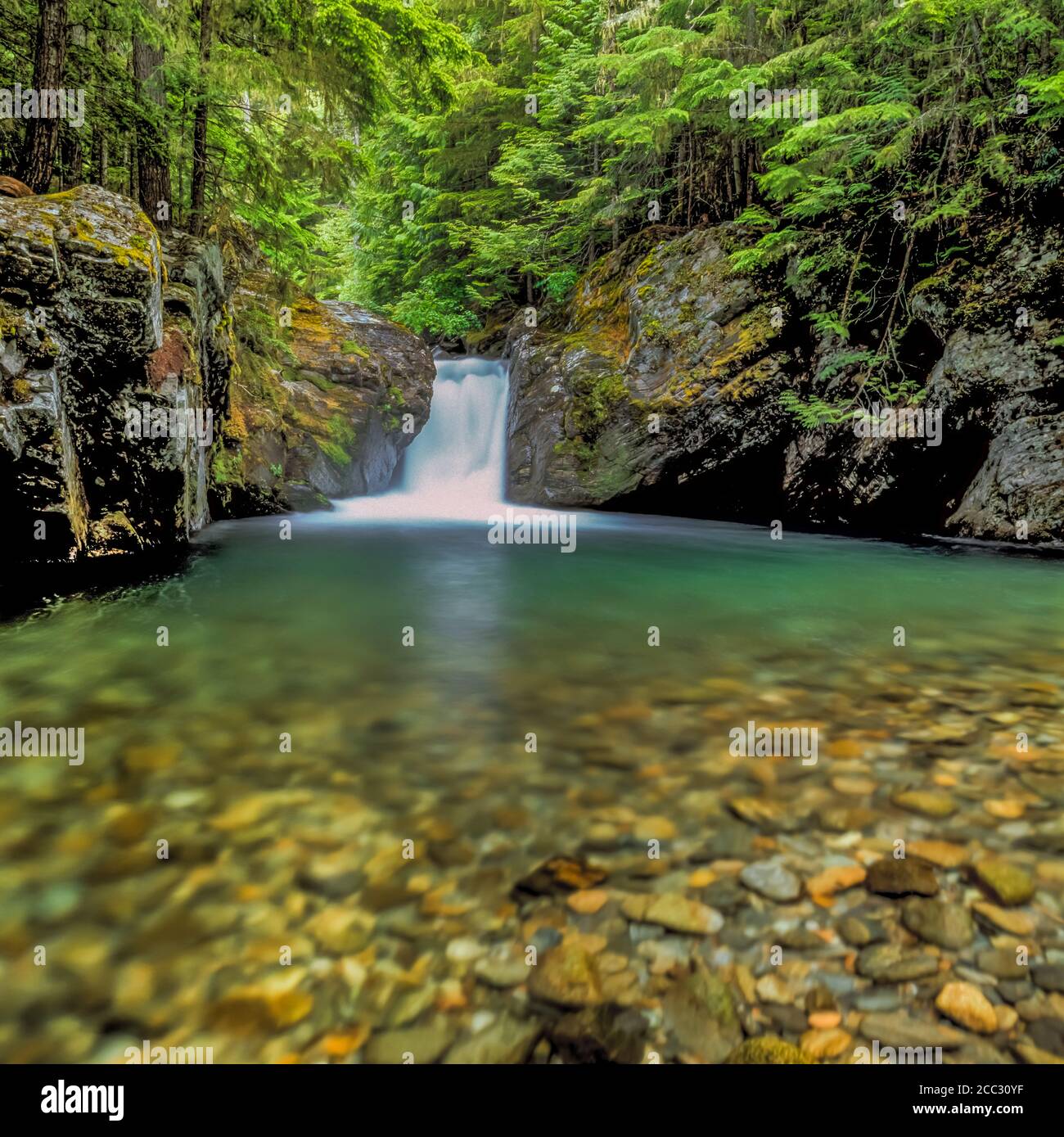 waterfall on granite creek in the mountains wilderness near
