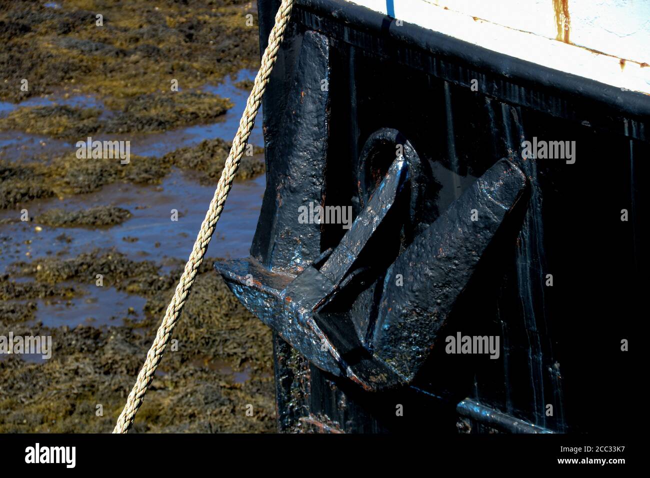Old fishing boat anchor at a harbour in Scotland Stock Photo - Alamy