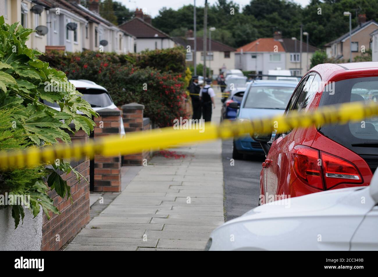 Merseyside Police at a suspected crime scene Stock Photo