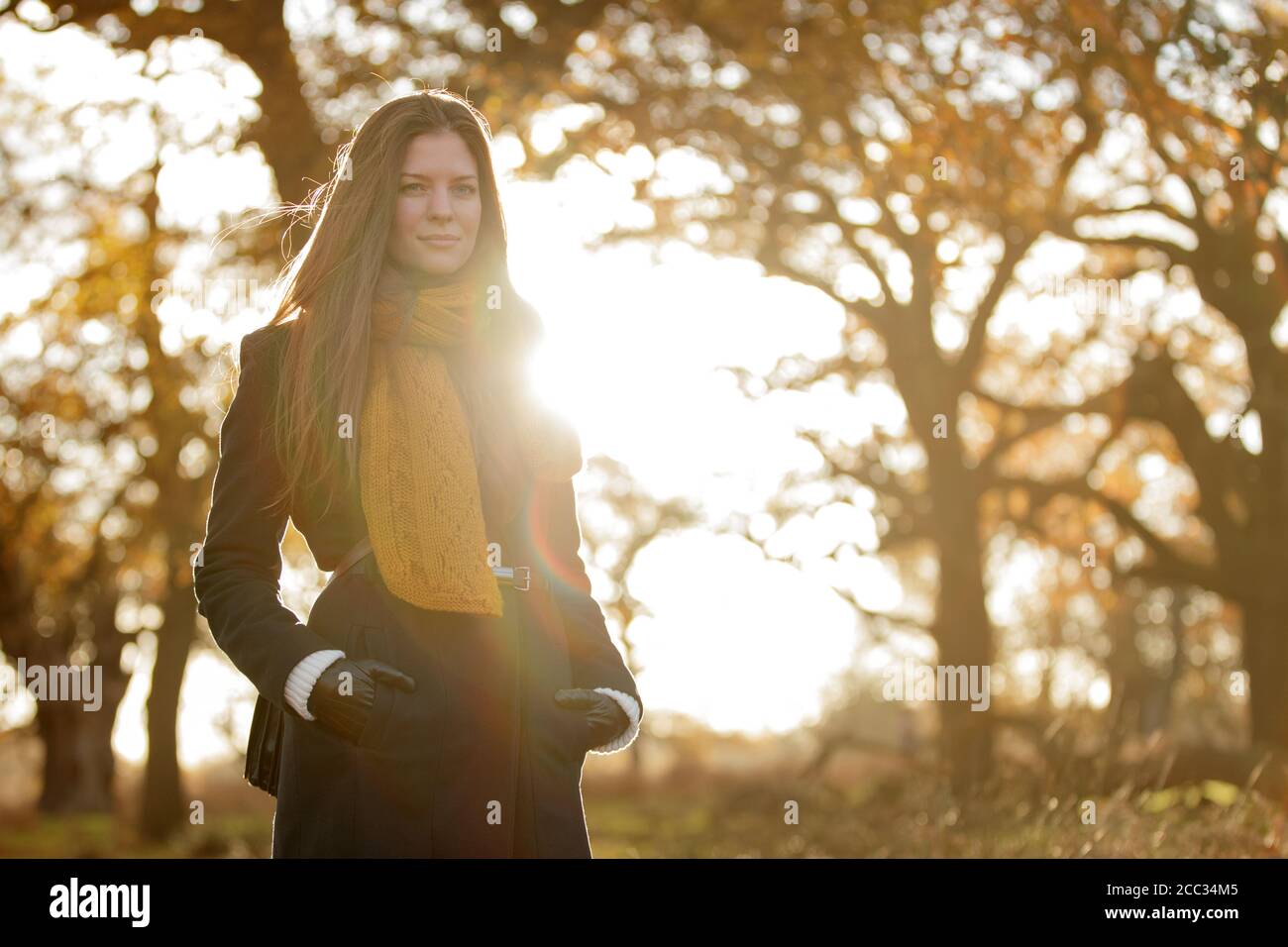 A pretty woman walking in Richmond Park Stock Photo