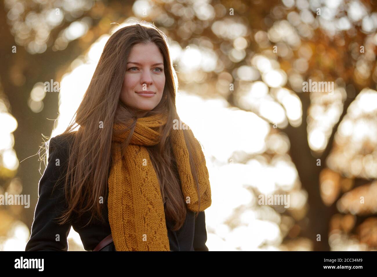 A pretty woman walking in Richmond Park Stock Photo