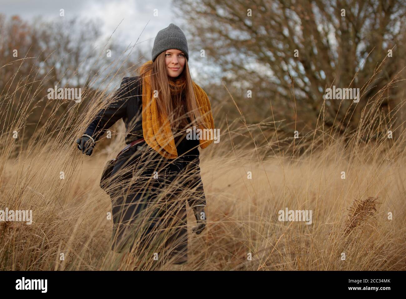 A pretty woman walking in Richmond Park Stock Photo