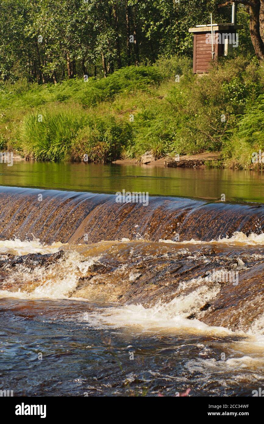 A view of the weir half way down Glen Orchy on the river Orchy, Scotland Stock Photo