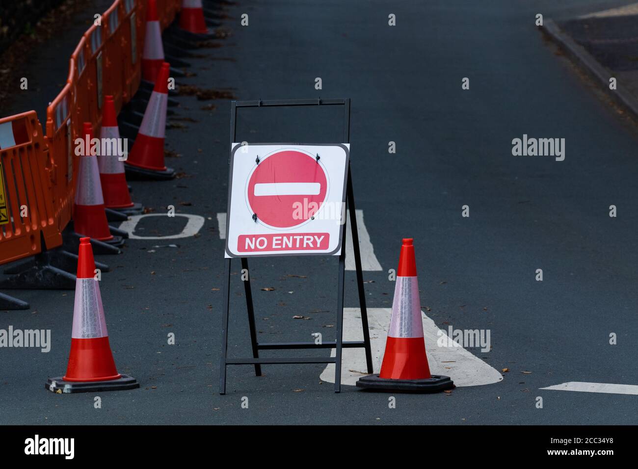 A road block in Baildon, Yorkshire. No Entry Signs, cones and barriers have been erected to stop traffic entering. Stock Photo