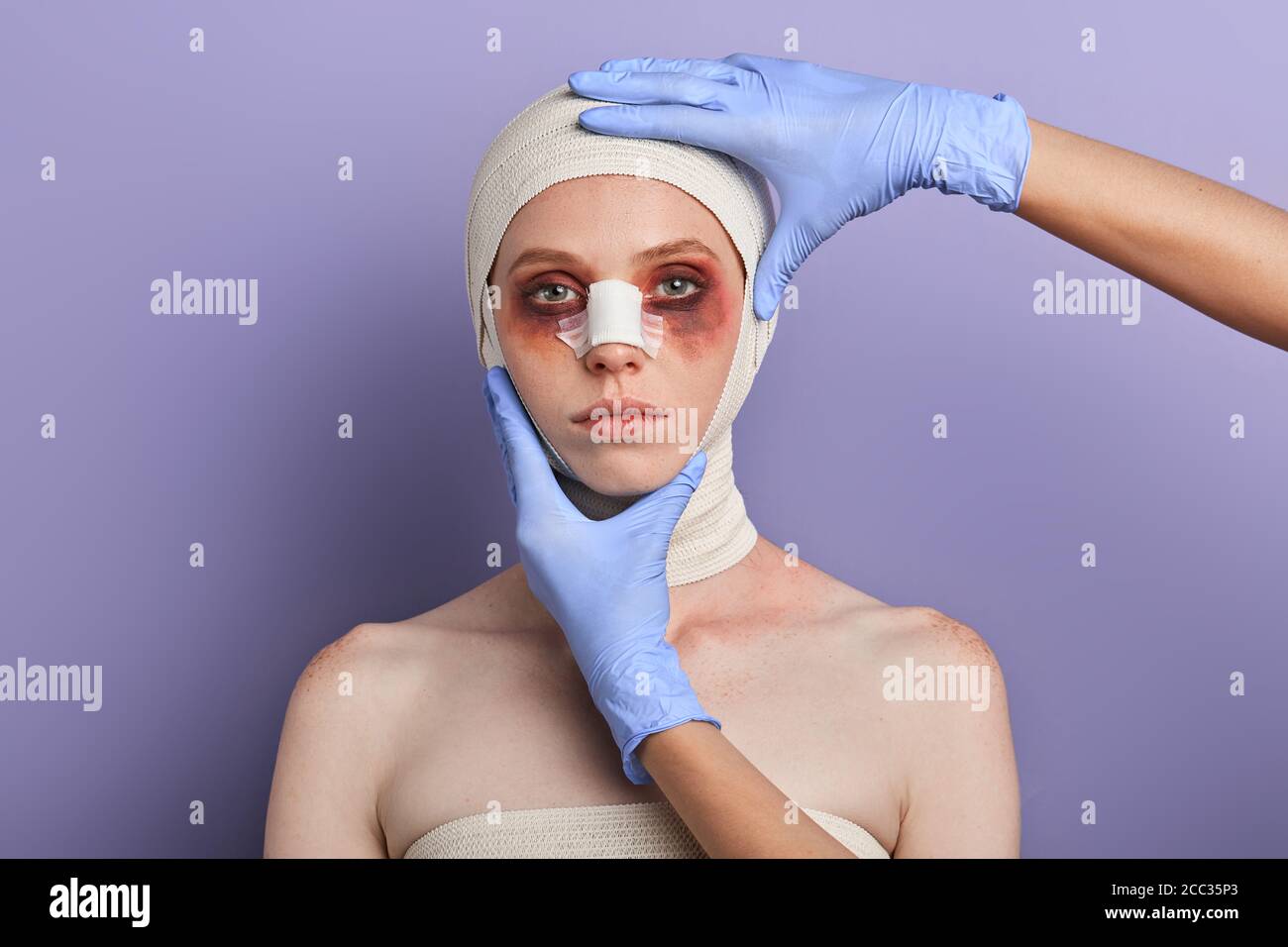 doctor in gloves planning surgical process in the clinic.observation of patients Stock Photo
