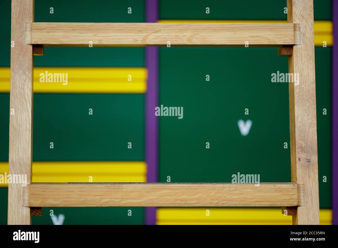 A ladder by the Championship draw board at Wimbledon Championships