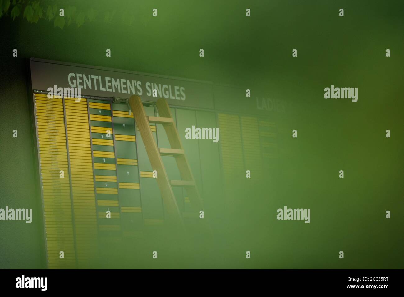 A ladder by the Championship Gentlemen's Singles draw board at