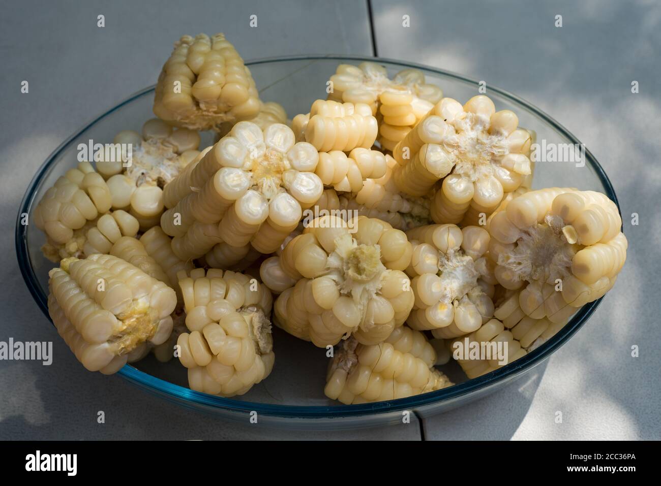 Close up of boiled Peruvian organic corn in a glass bowl. Stock Photo