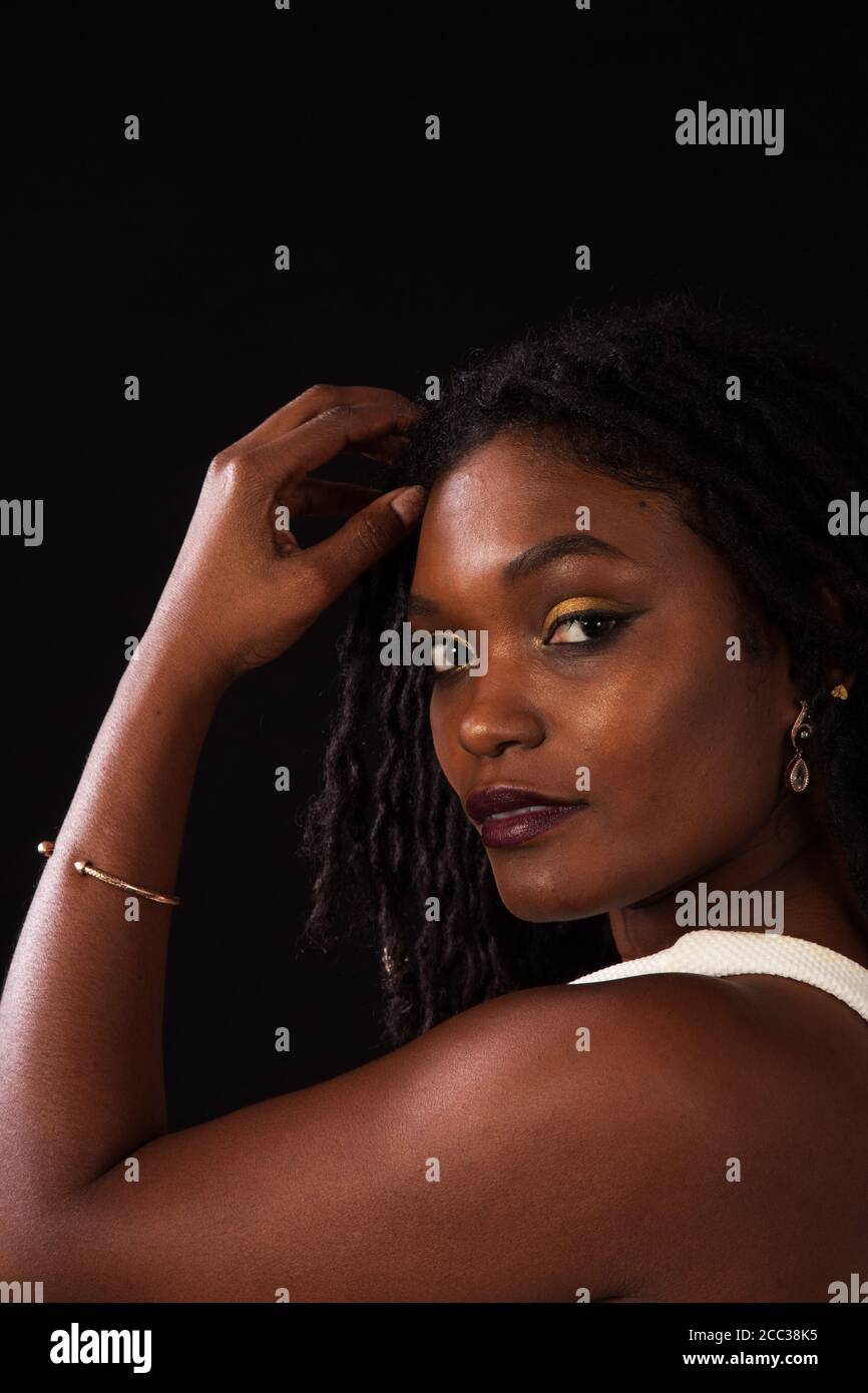 Pensive african woman in hi-res stock photography and images - Alamy