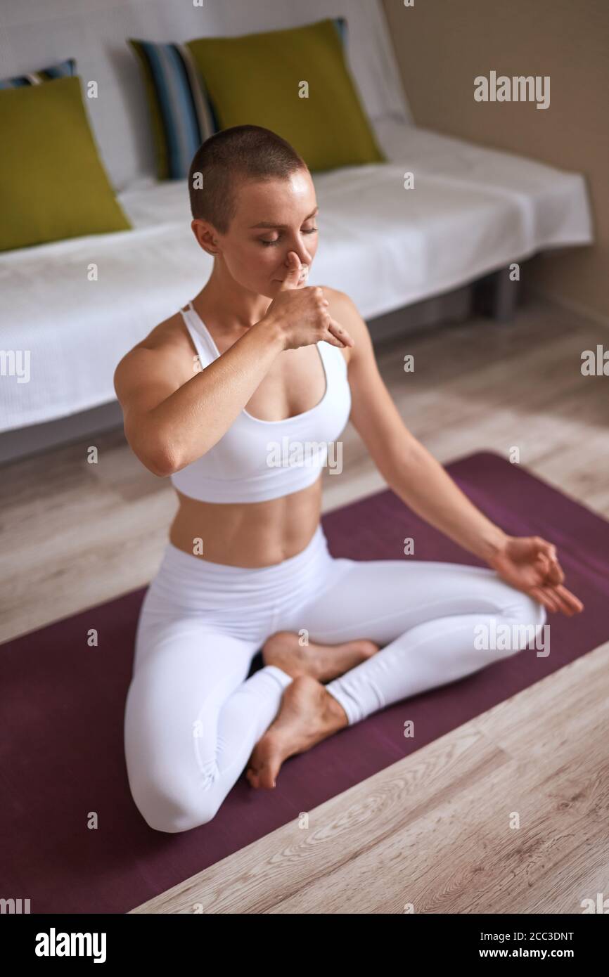 Nostril breathing yoga hi-res stock photography and images - Alamy