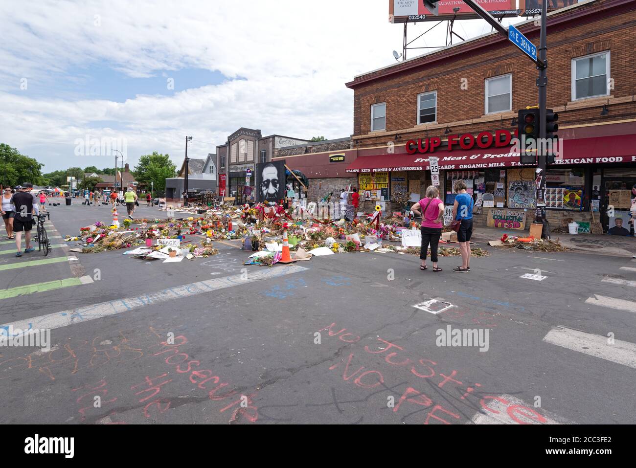 MPLS, MN/USA - JUNE 21, 2020: Visitors at memorial site for george floyd whose arrest and death ignited nationwide protests for police reform. Stock Photo