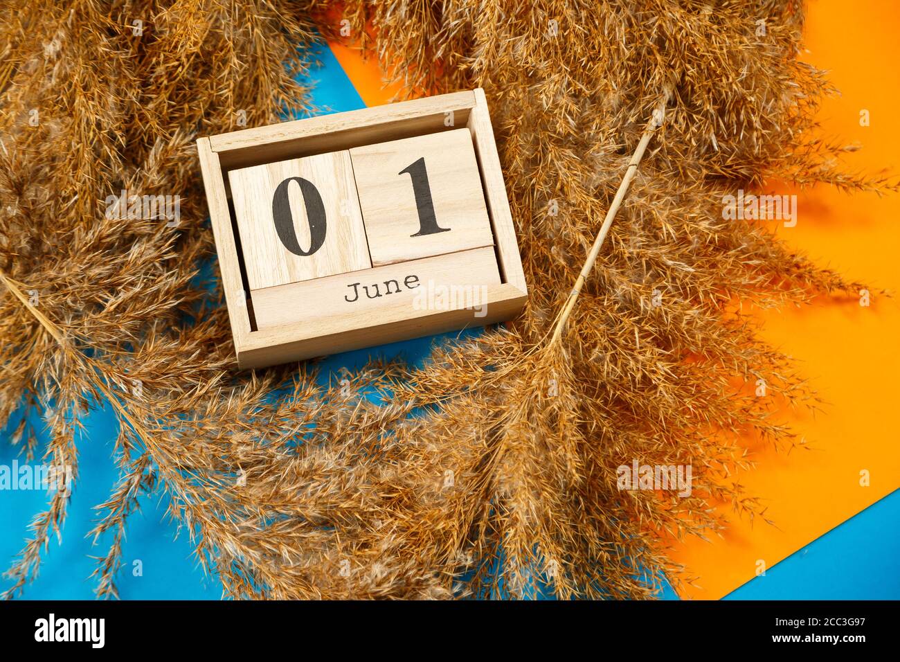 Calendar Of Wooden Cubes With Numbers And Months Choosing A Number On 