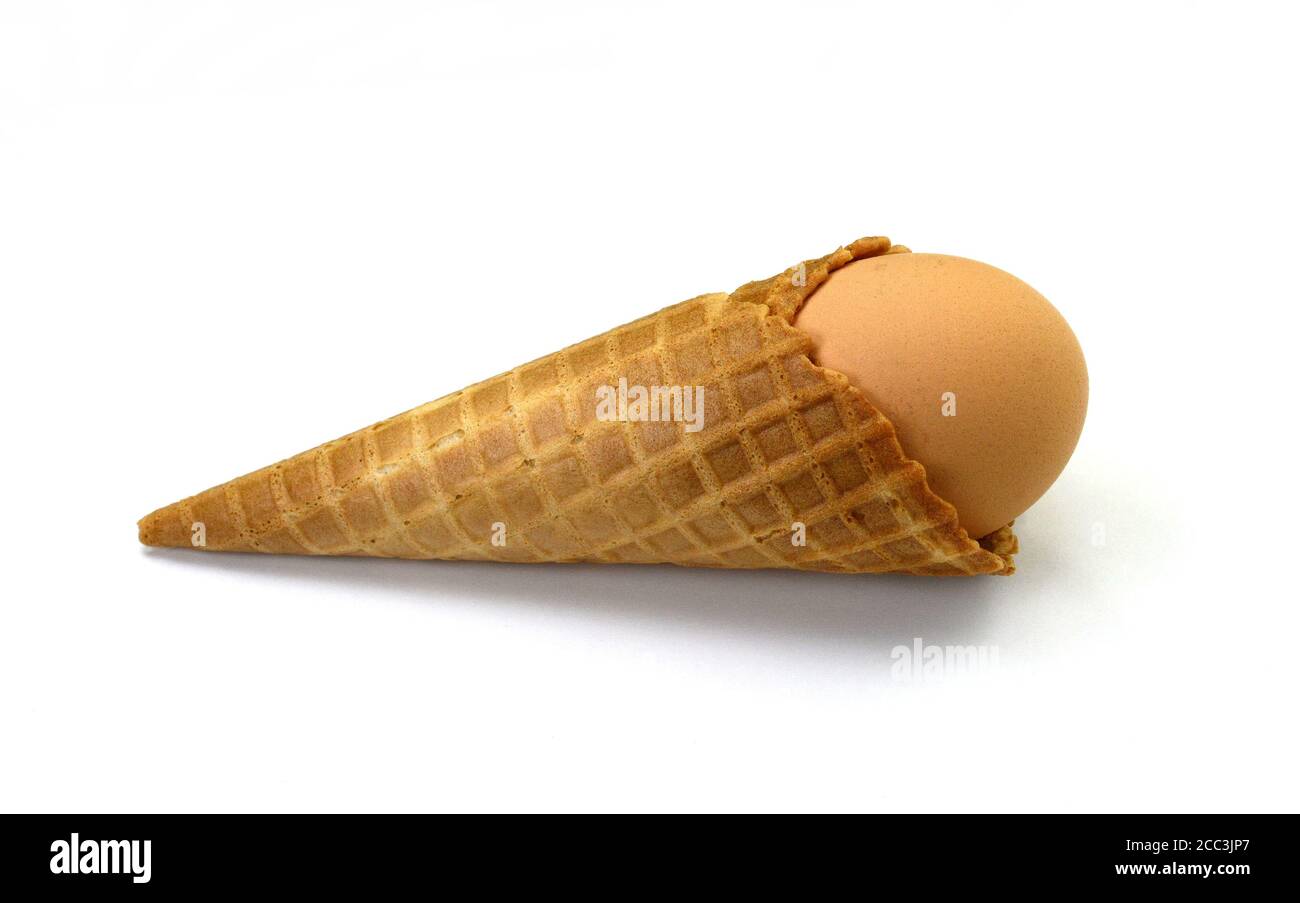 egg in waffle cup isolated Stock Photo